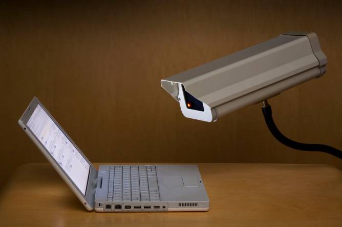 camera pointed at laptop