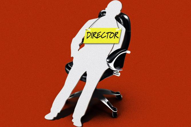 A cutout of a company director sitting on a chair