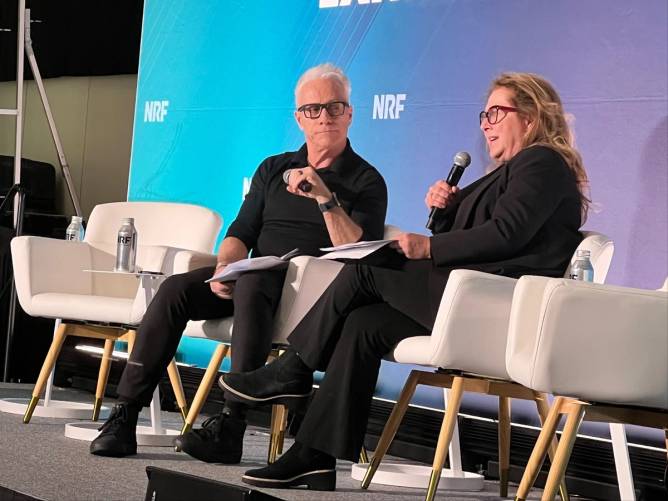 Carol Leaman (right) and Martin Newman seated onstage at NRF's Big Show.