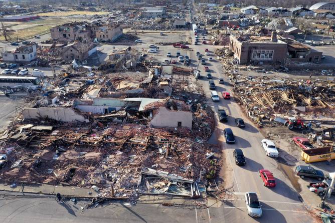 homes and businesses are destroyed after a tornado ripped through Mayfield, Kentucky the previous evening