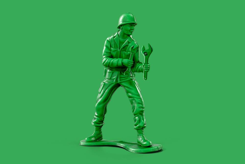 Army man toy with a wrench