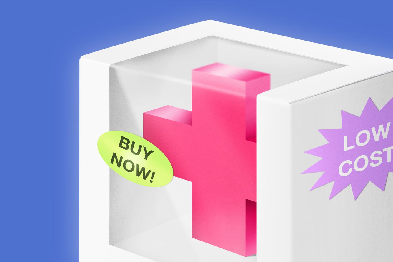Close up of a healthcare cross in a transparent box with "low cost" and "buy now!" stickers.