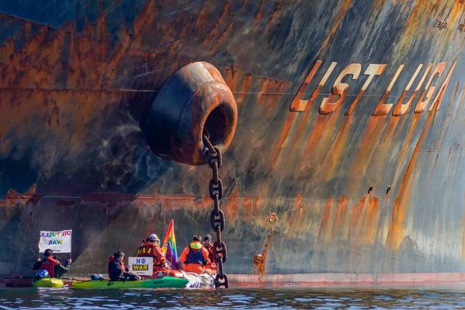 Greenpeace environmental activists stage an action against the ship Ust Luga