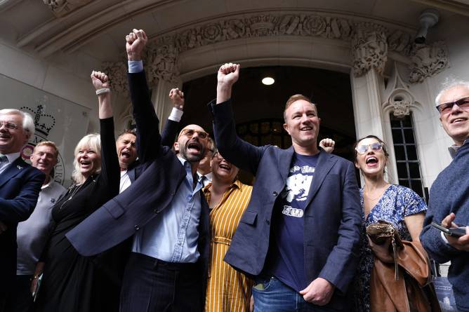 Former traders Tom Hayes and Carlo Palombo celebrating after their convictions were overturned