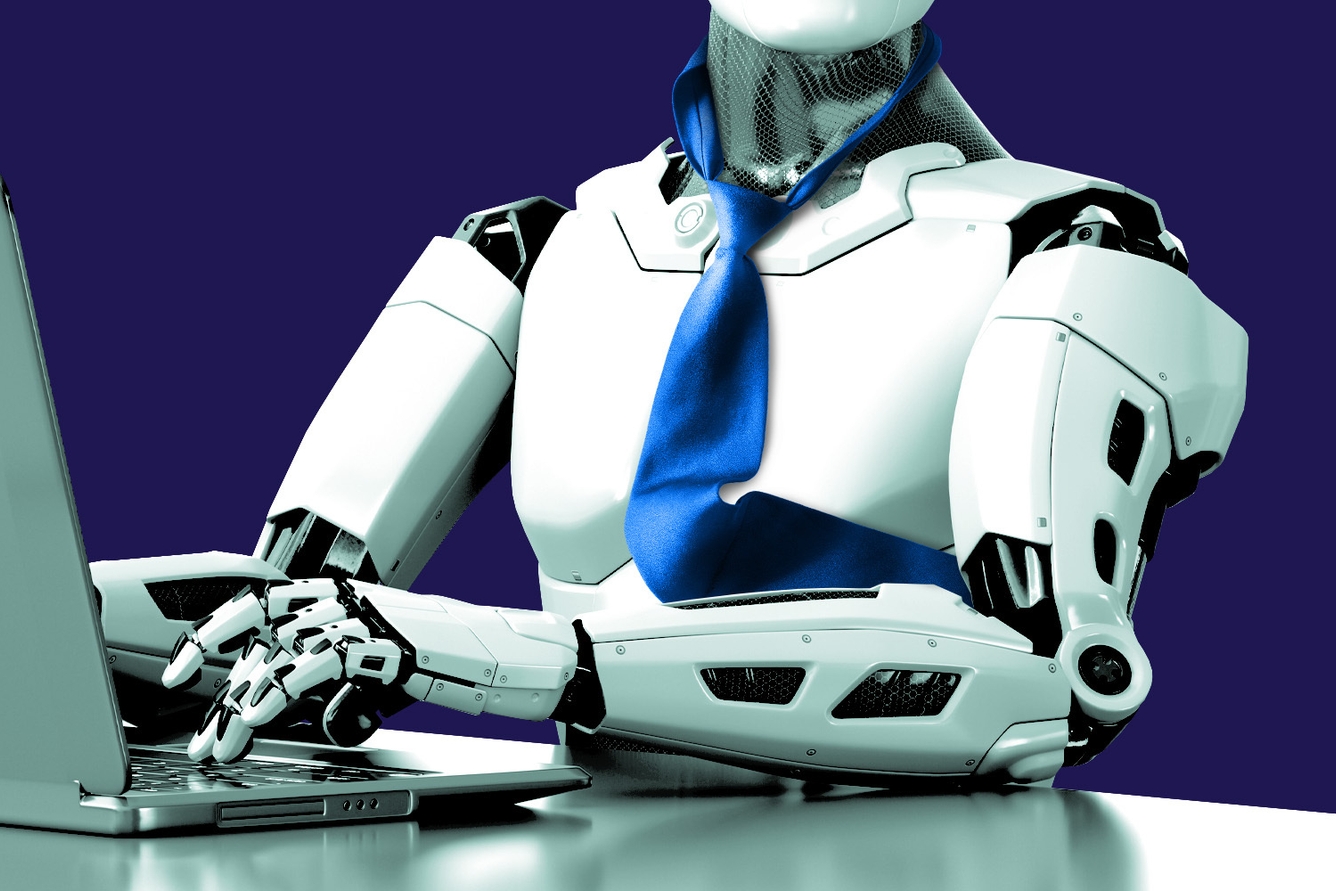 robot with tie working on computer