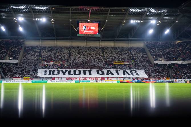 Choreography of SC Freiburg fans before the game with the inscription "Boycott Qatar" as a protest action against the World Cup in Qatar.