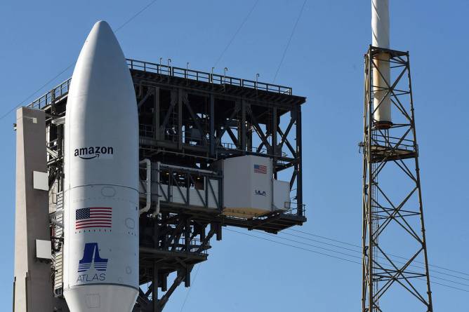 Amazon-branded satellite rocket on a launchpad