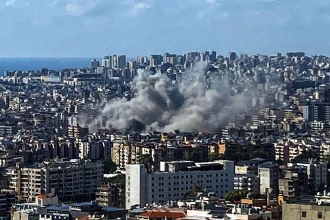 Smoke billows after an Israeli airstrike on Beirut