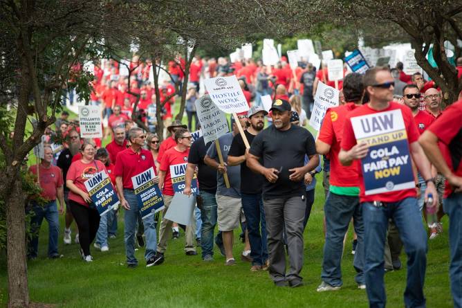 United Auto Workers members picket at Stellantis headquarters