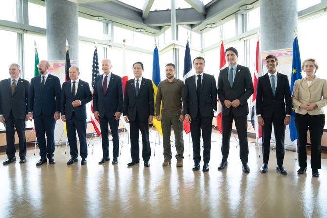 Ukrainian President Volodymyr Zelensky (5th from right) joins G7 world leaders on the final day of the G7 Summit on May 21, 2023 in Hiroshima, Japan.