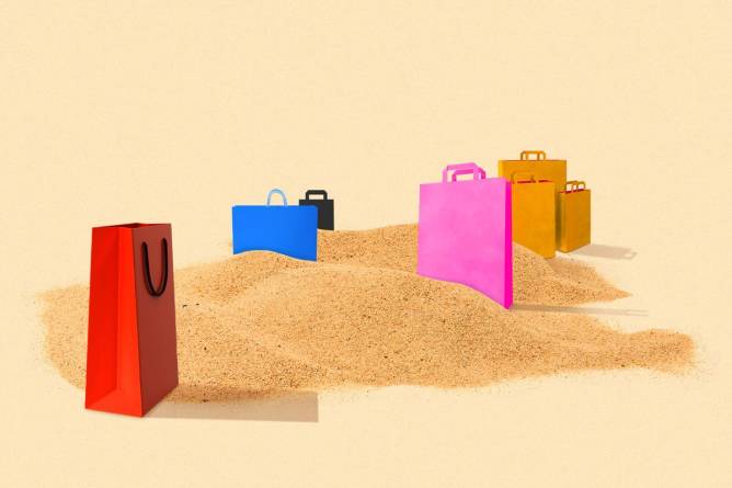 shopping bags in the sand