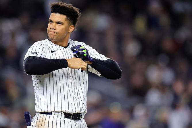 Juan Soto #22 of the New York Yankees reacts after grounding out against the Los Angeles Dodgers in the third inning during Game Three of the 2024 World Series