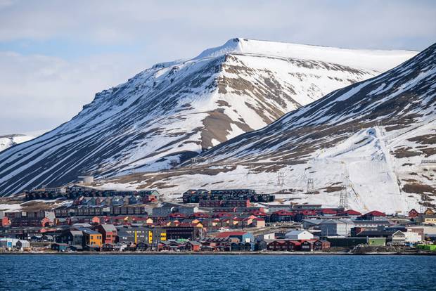 Pictured taken on May 16, 2024 from a boat shows the view of Longyearbyen, located on Spitsbergen island, in Svalbard Archipelago, northern Norway.