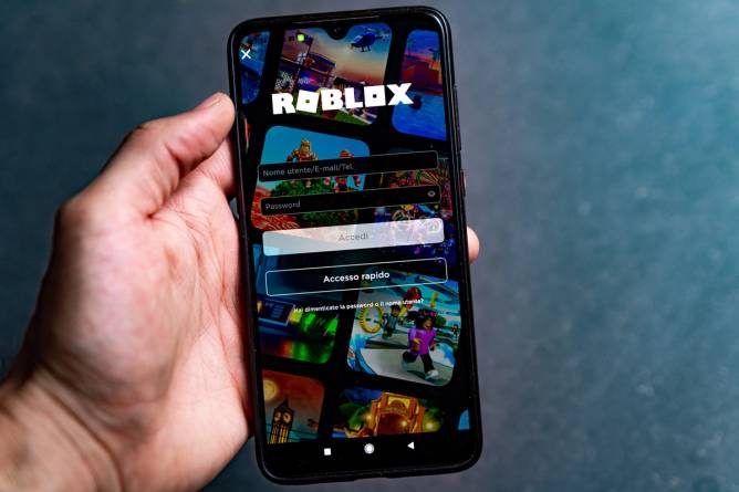 Roblox app seen displayed on a smartphone screen.