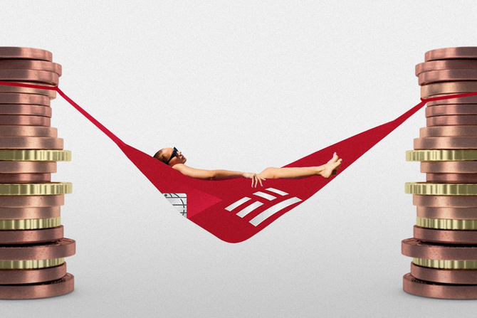 A person lounges in a debit card hammock, between two stacks of coins.