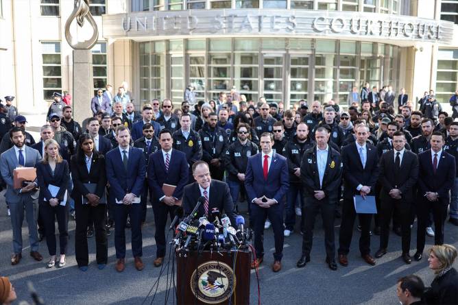 US attorney John J. Durham, flanked by DEA officers, speaks to the press outside the US District court eastern district of New York City on February 28, 2025, after the arraignment of drug cater kingpin Rafael Caro Quintero and Vicente Castillo Fuentes. Mexico handed over 29 alleged drug lords to the United States for reasons of national security and outside the countries’ extradition treaty, the attorney general Alejandro Gertz said on February 28.