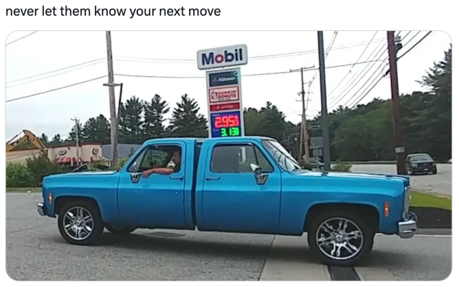 A two-faced blue pickup truck