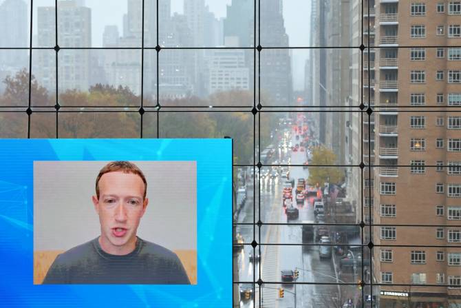 Zuckerberg over zoom with office window in background