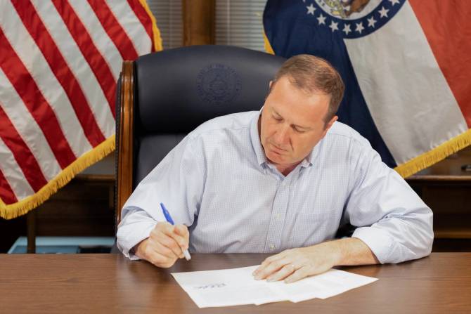 Missouri Attorney General Eric Schmitt signs legislation outlawing abortion in the state