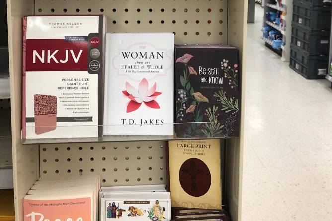 a shelf end cap with Bibles and other religious books 