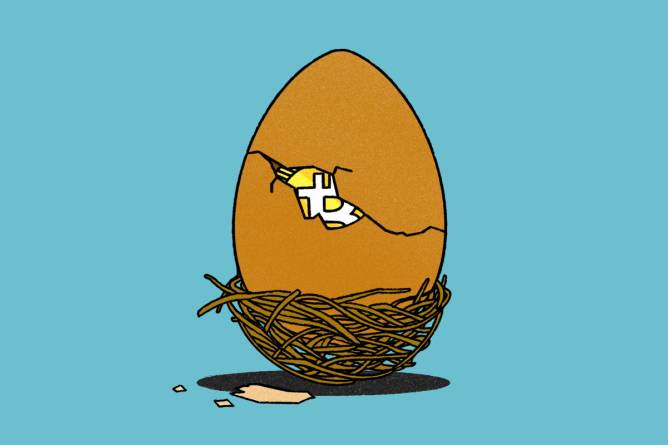 Bitcoin peaking out of cracked egg in nest