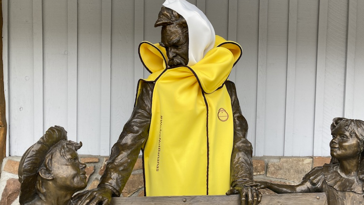 Statue in banana costume as part of Sun Bum campaign