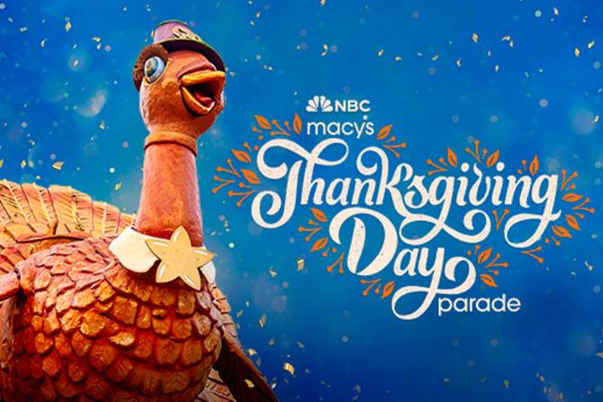 A parade balloon shaped like a turkey wearing a hat and collar appears next to the words NBC Macy's Thanksgiving Day parade on a blue speckled background.