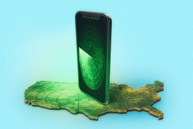 a phone on top of the US map on a blue background