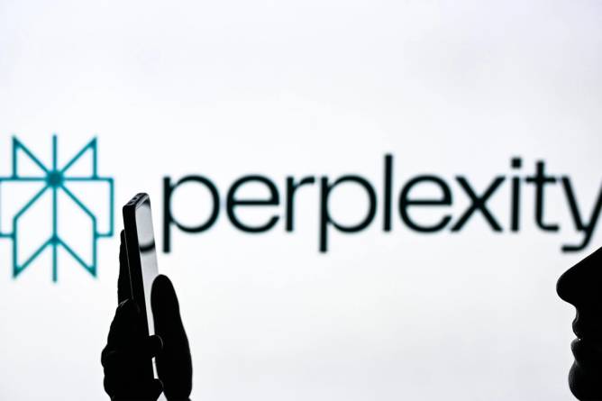 An image of a woman holding a cell phone in front of a Perplexity AI logo