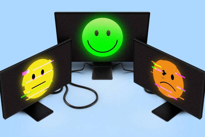 Computers displaying faces with different emotions