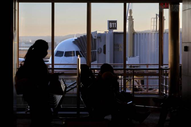 Travelers at an airport 