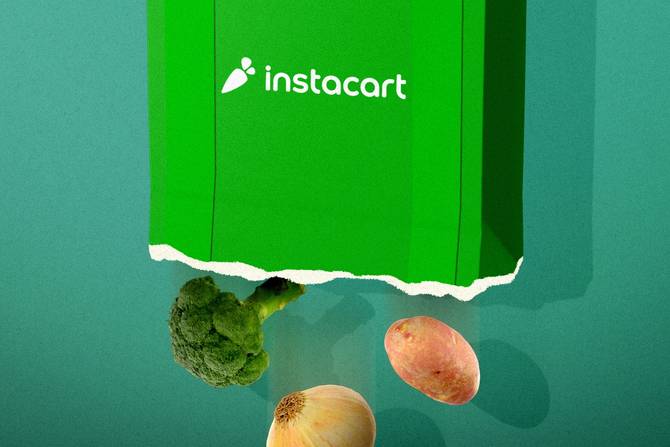 Instacart bag with hole at the bottom and groceries are falling out.