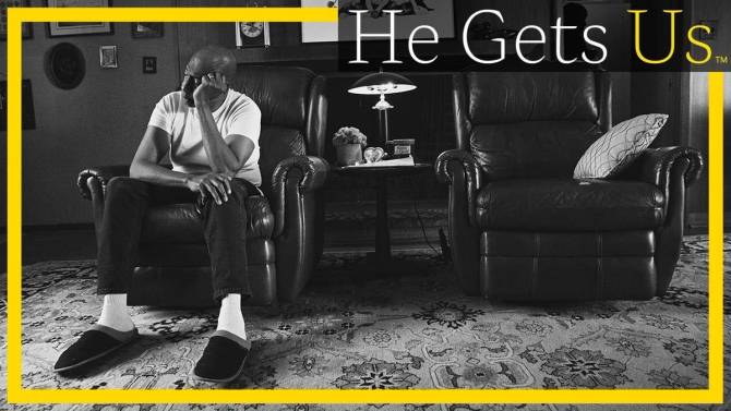 Man sitting in an armchair screenshot from "He Gets Us" Jesus ad