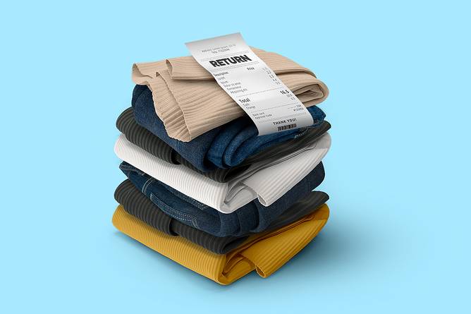 A stack of clothing with a slip of paper that says "Returns."