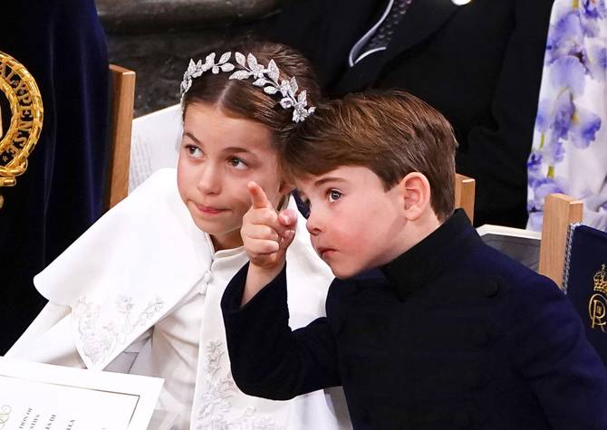 Britain's Prince Louis and Princess Charlotte attend the Coronation of King Charles III and Queen Camilla