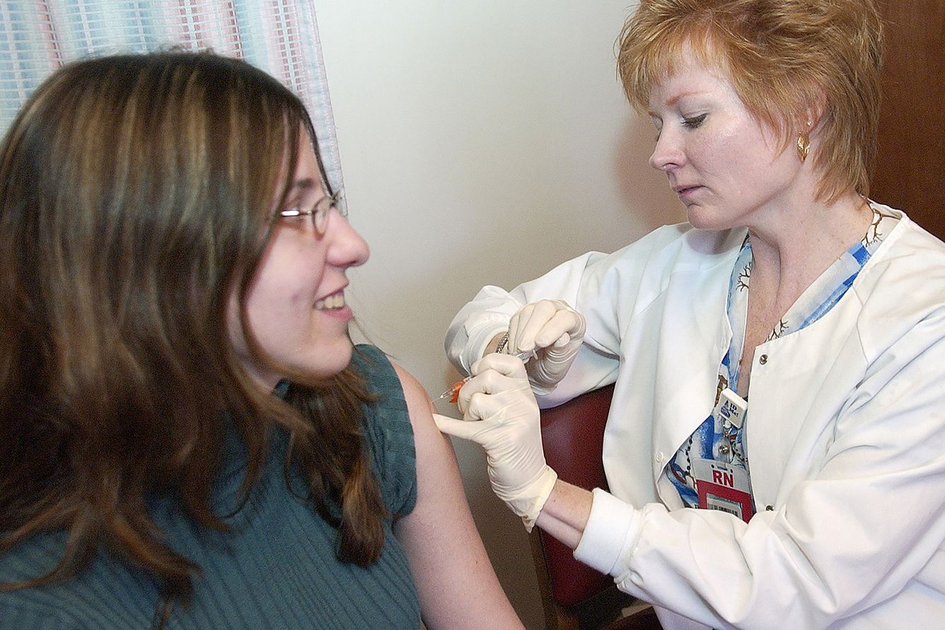 Stephanie S. McDonough gets an injection of Gardasil vaccine, which prevents HPV, from Debra K. Lillington at the Reading Hospital.