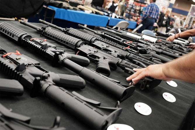 Assault rifles for sale at a gun show