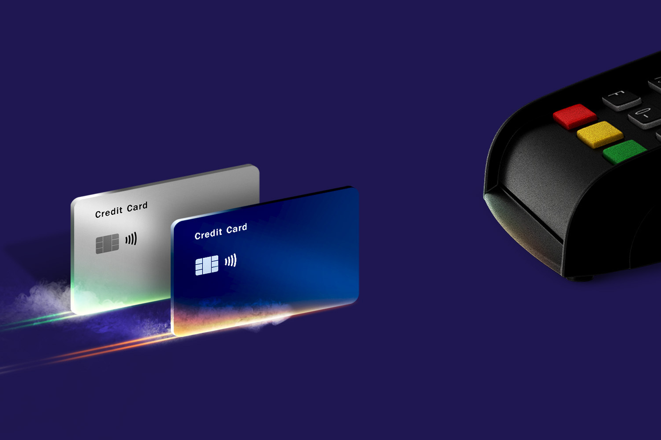 Two credit cards racing each other to a payment terminal machine