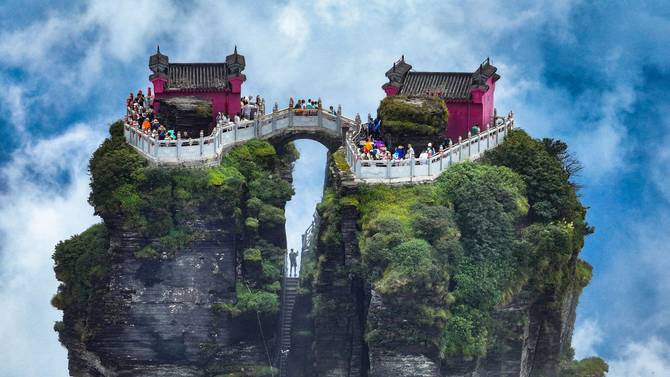 Tourists visit Mount Fanjing on July 23, 2023 in Tongren, Guizhou Province of China