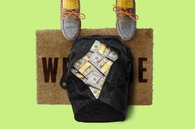 A doormat with a bag of money on it