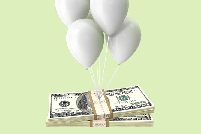 balloons holding up money 