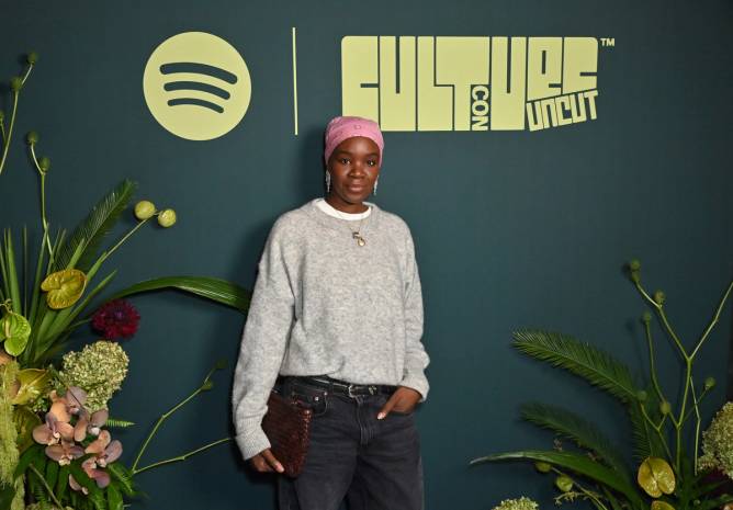 Recho Omondi, who hosts The Cutting Room Floor podcast, is pictured against a blue background.