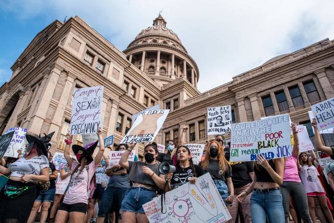Protesters take part in the Women's March and Rally for Abortion Justice at the State Capitol in Austin, Texas