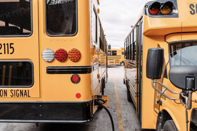 Electric school buses plugged in.