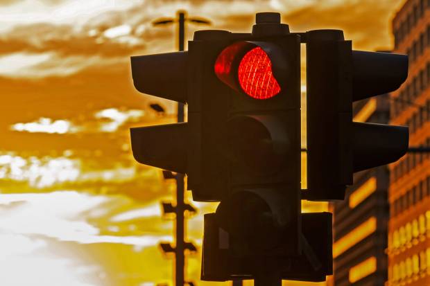 Stoplight at sunset