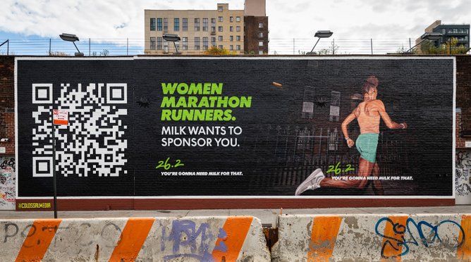 A billboard in Brooklyn reads "Women Marathon Runners. Milk wants to sponsor you." with smaller text reading: "26.2. You're gonna need milk for that." and an image of a woman running in a tank top