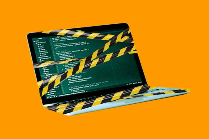 Laptop wrapped in security tape.