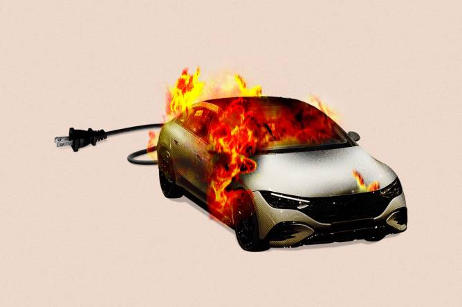 Car on fire attached with an unplugged electrical cord.