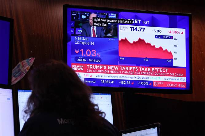 Trader watching stock market sink on tv