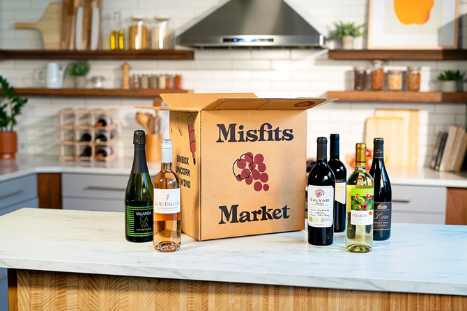 Misfits Market box surrounded by various wines